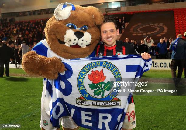 Blackburn Rovers' Jack Payne celebrates getting promoted after the Sky Bet League One match at the Keepmoat Stadium, Doncaster.