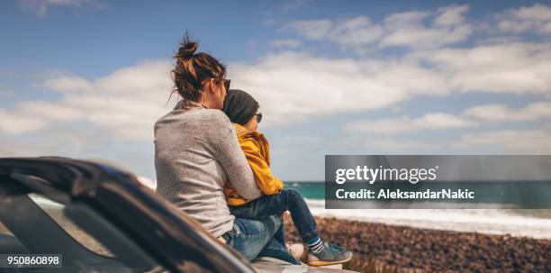 enjoying seaside view with my mom - family panoramic stock pictures, royalty-free photos & images