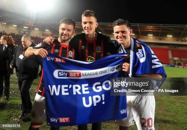 Blackburn Rovers' Marcus Antonsson and team mates celebrate getting promoted after the Sky Bet League One match at the Keepmoat Stadium, Doncaster.