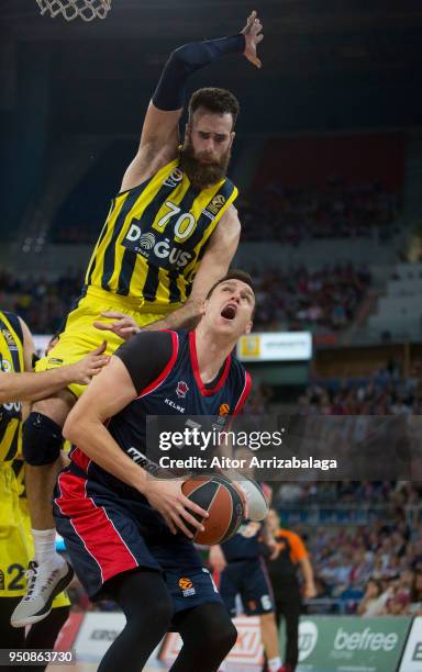 Johannes Voigtmann, #7 of Kirolbet Baskonia Vitoria Gasteiz competes with Luigi Datome, #70 of Fenerbahce Dogus Istanbul during the Turkish Airlines...