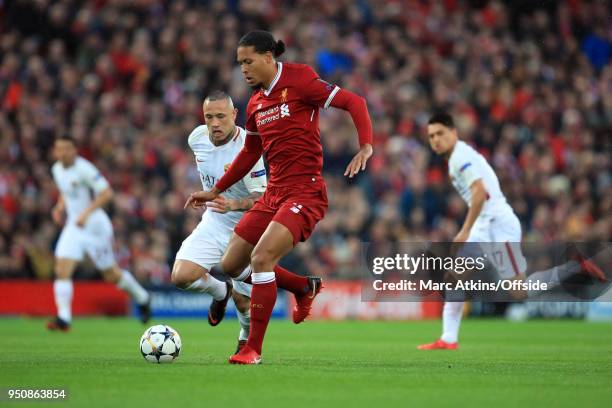 Virgil van Dijk of Liverpool in action with Radja Nainggolan of A.S.Roma during the UEFA Champions League Semi Final First Leg match between...