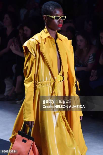 Model presents a creation by Led during the Sao Paulo Fashion Week in Sao Paulo, Brazil on April 24, 2018.