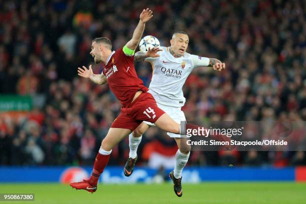 Jordan Henderson of Liverpool battles with Radja Nainggolan of Roma during the UEFA Champions League Semi Final First Leg match between Liverpool and...