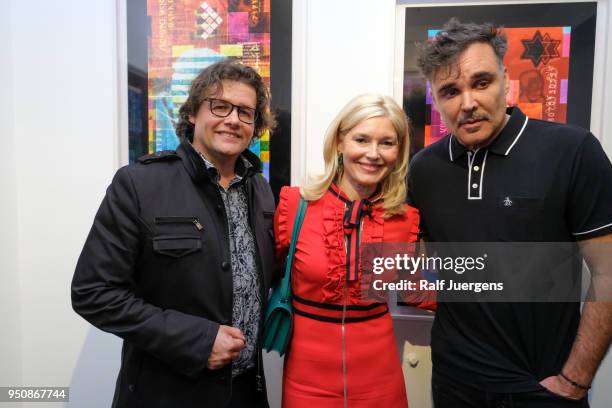 Dirk Geuer, Petra Dieners and David LaChappelle attend the 'LACHAPELLE - Negative Currency' Exhibition Opening at Geuer und Geuer on April 24, 2018...