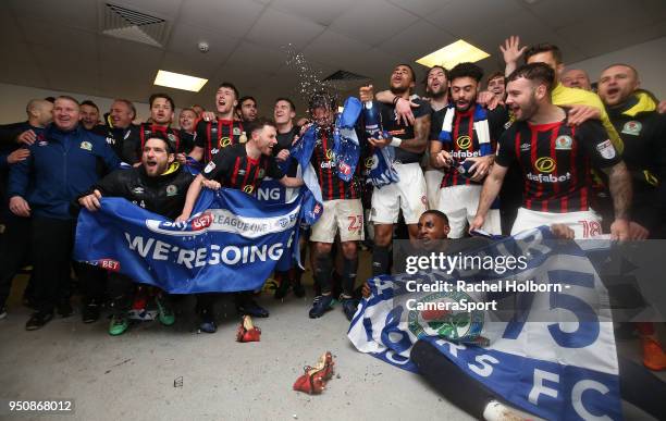 Blackburn Rovers' celebrate promotion in the dressing room after the game during the Sky Bet League One match between Doncaster Rovers and Blackburn...