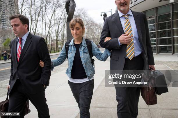 Actress Allison Mack leaves U.S. District Court for the Eastern District of New York after a bail hearing, April 24, 2018 in the Brooklyn borough of...
