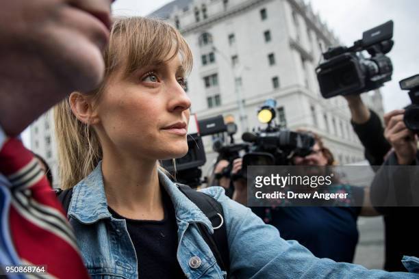 Actress Allison Mack leaves U.S. District Court for the Eastern District of New York after a bail hearing, April 24, 2018 in the Brooklyn borough of...