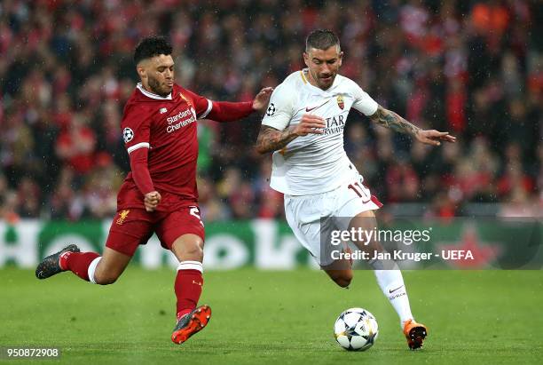 Aleksandar Kolarov of A.S Roma is tackled by Alex Oxlade-Chamberlain of Liverpool during the UEFA Champions League Semi Final First Leg match between...