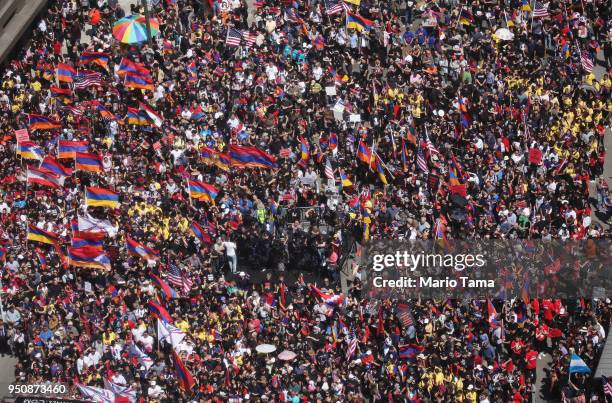 Demonstrators protest outside the Turkish Consulate during a march and rally commemorating the 103rd anniversary of the Armenian genocide on April...