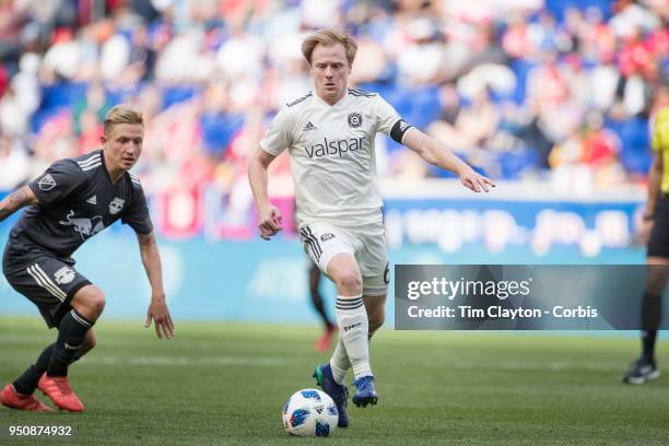 Dax McCarty of Chicago Fire challenged by Marc Rzatkowski of New York Red Bulls during the New York Red Bulls Vs Chicago Fire MLS regular season game...