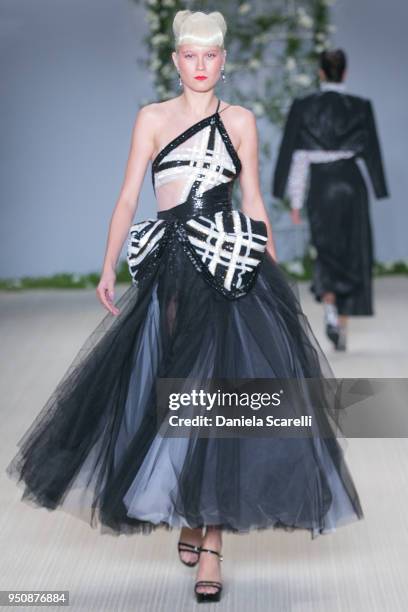 Model walks at Samuel Cirnansck Runway at SPFW N45 Summer 2019 at Ibirapuera's Bienal Pavilion on April 23, 2018 in Sao Paulo, Brazil.