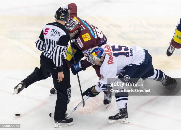 James Sheppard of Eisbaeren Berlin in action with Jason Jaffray of Red Bull Muenchen during the DEL Playoff final match 6 between Eisbaeren Berlin...