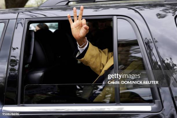 Actor and comedian Bill Cosby gestures as he leaves after the closing arguments in the retrial of his sexual assault case at the Montgomery County...