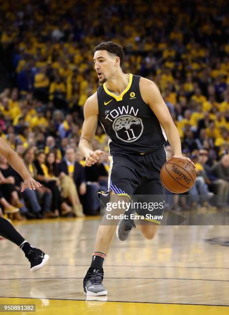 Klay Thompson of the Golden State Warriors in action against the San Antonio Spurs during Game 2 of Round 1 of the 2018 NBA Playoffs at ORACLE Arena...