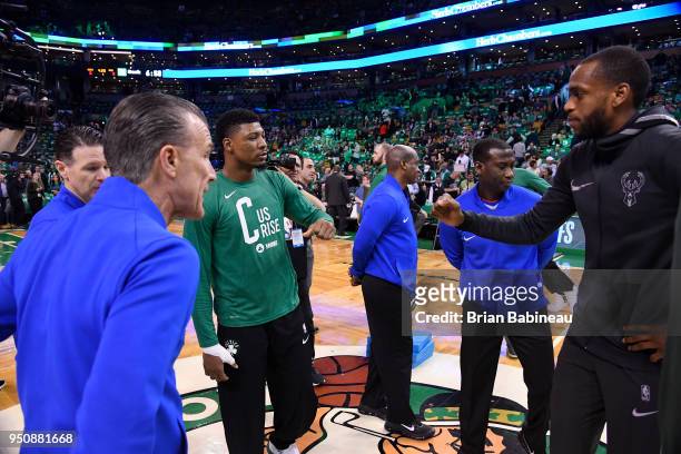 Marcus Smart of the Boston Celtics and Khris Middleton of the Milwaukee Bucks exchange a handshake prior to Game Five of Round One of the 2018 NBA...