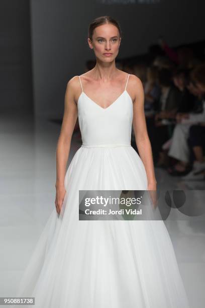 Model walks the runway for the Cristina Tamborero collection during Barcelona Bridal Fashion Week at Fira de Barcelona on April 24, 2018 in...