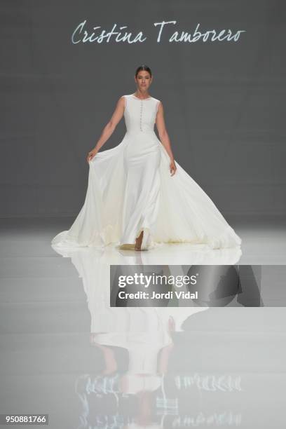 Model walks the runway for the Cristina Tamborero collection during Barcelona Bridal Fashion Week at Fira de Barcelona on April 24, 2018 in...