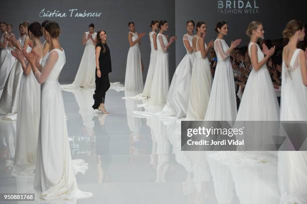 Cristina Tamborero salutes the audience after the presentation of her collection during Barcelona Bridal Fashion Week at Fira de Barcelona on April...