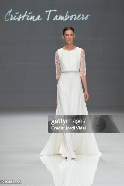 Model walks the runway for the Cristina Tamborero collection during Barcelona Bridal Fashion Week at Fira de Barcelona on April 24, 2018 in...