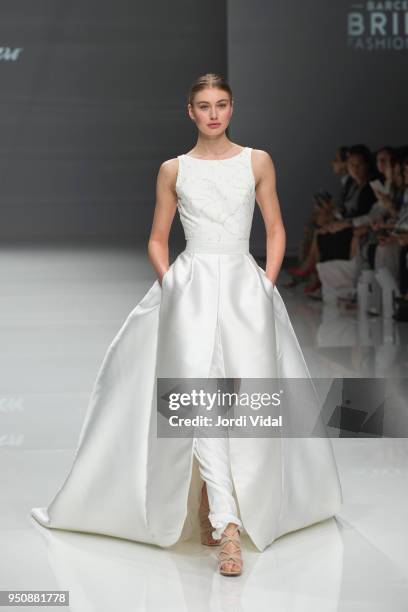 Model walks the runway for the Cristina Tamborero collection during Barcelona Bridal Fashion Week at Fira de Barcelona on April 24, 2018 in...