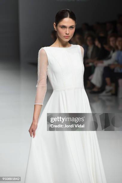 Model walks the runway for the Cristina Tamborero collection during Barcelona Bridal Fashion Week at Fira de Barcelona on April 24, 2018 in...