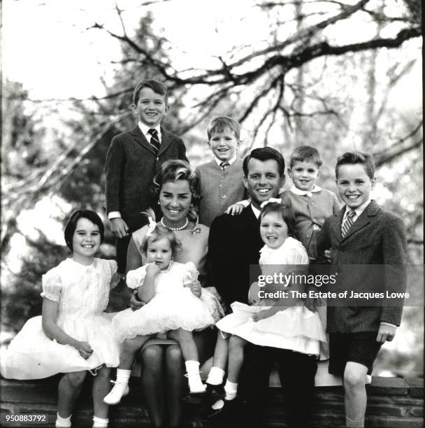 Portrait of married couple Ethel Skakel Kennedy and US Attorney General Robert F Kennedy as they pose with their children, McLean, Virginia, March...