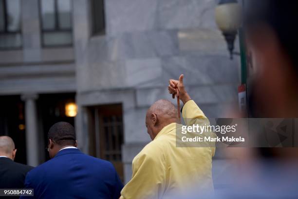 Bill Cosby gives a thumbs up sign while departing the Montgomery County Courthouse after the twelfth day of his sexual assault retrial on April 24,...