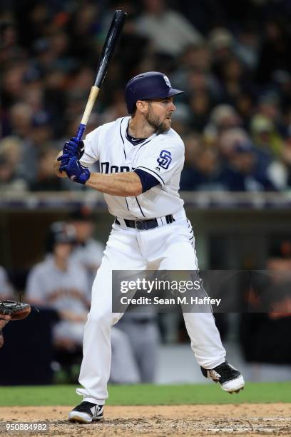 Austin Hedges of the San Diego Padres at bat during a game against the San Francisco Giants at PETCO Park on April 12, 2018 in San Diego, California.