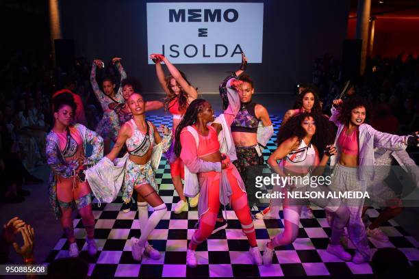 Performers present a creations by Memo e Isolda, during the Sao Paulo Fashion Week in Sao Paulo, Brazil on April 24, 2018.
