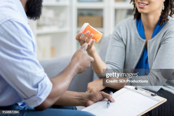 mental health professional prescribing anti depressant - drug evaluation stock pictures, royalty-free photos & images