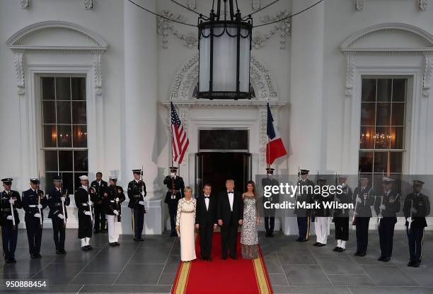 President Donald Trump, and U.S. First lady Melania welcome French President Emmanuel Macron, French first lady Brigitte Macron after their arrival...