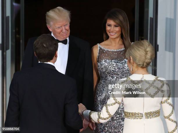 President Donald Trump, and U.S. First lady Melania welcome French President Emmanuel Macron, French first lady Brigitte Macron after their arrival...