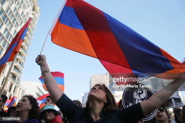 Demonstrators protest outside the Turkish Consulate during a rally commemorating the 103rd anniversary of the Armenian genocide on April 24, 2018 in...