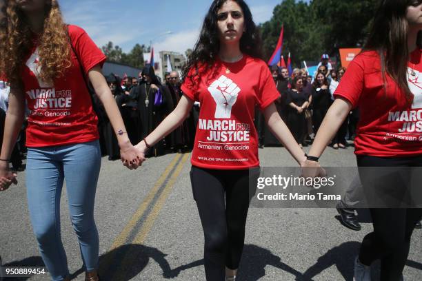 Demonstrators march towards the Turkish Consulate during a rally commemorating the 103rd anniversary of the Armenian genocide on April 24, 2018 in...