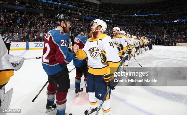 Ryan Ellis of the Nashville Predators shakes hands with Colin Wilson of the Colorado Avalanche after Game Six of the Western Conference First Round...