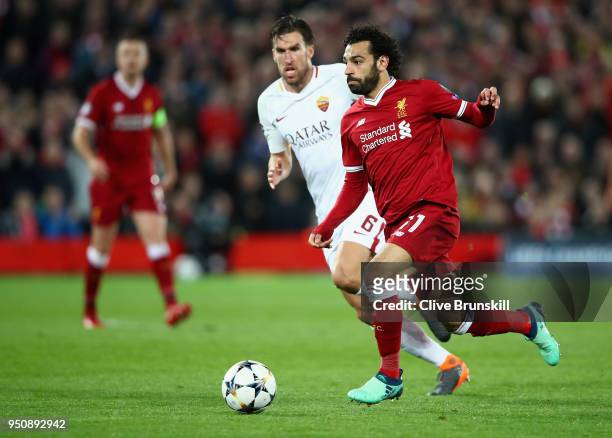 Mohamed Salah of Liverpool moves away from Kevin Strootman of AS Roma during the UEFA Champions League Semi Final First Leg match between Liverpool...
