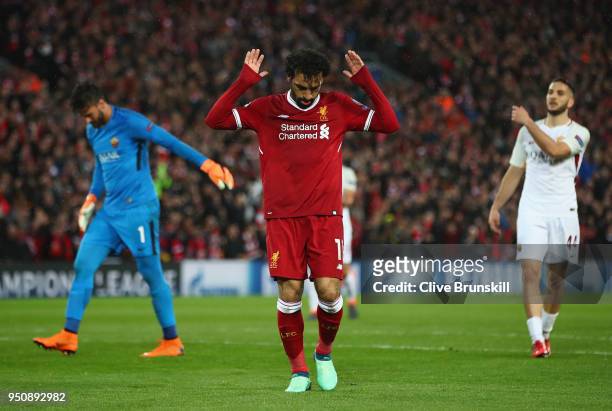 Mohamed Salah of Liverpool celebrates scoring his second goal during the UEFA Champions League Semi Final First Leg match between Liverpool and A.S....