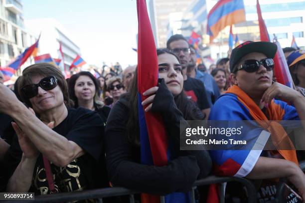 Demonstrators rally outside the Turkish Consulate during a march and rally commemorating the 103rd anniversary of the Armenian genocide on April 24,...