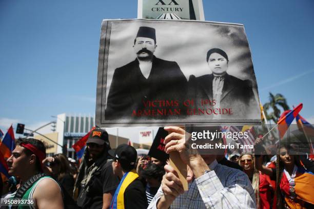 Demonstrators march towards the Turkish Consulate during a march and rally commemorating the 103rd anniversary of the Armenian genocide on April 24,...