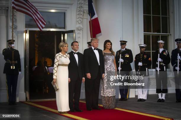 First Lady Melania Trump, from right, U.S. President Donald Trump, Emmanuel Macron, France's president, and Brigitte Macron, France's first lady,...