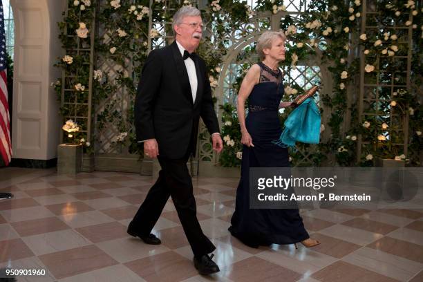 National Security Advisor John Bolton and his wife Gretchen arrive at the White House for a state dinner April 24, 2018 in Washington, DC . President...