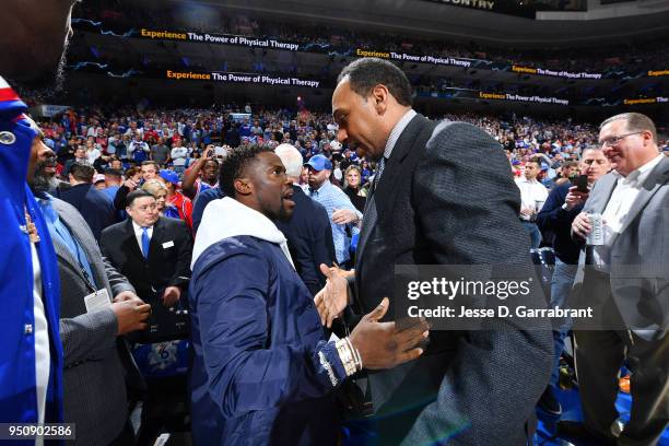 Kevin Hart and Stephen A. Smith talk before the game between the Philadelphia 76ers and the Miami Heat in Game Five of Round One of the 2018 NBA...