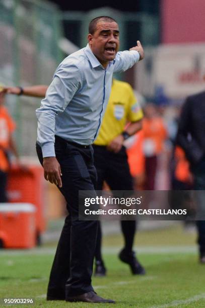 Venezuela's Deportivo Lara head coach Leonardo Gonzalez gives instructions to his players, during their Copa Libertadores football match against...