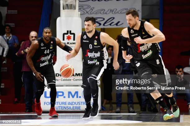 Marcus Slaughter and Alessandro Gentile and Filippo Baldi Rossi of Segafredo in action during the LBA LegaBasket of Serie A match between Vanoli...