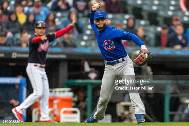 Third baseman Tommy La Stella of the Chicago Cubs throws out Francisco Lindor of the Cleveland Indians on a sacrifice bunt in the third inning at...