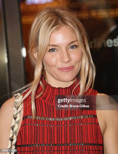 Sienna Miller poses at the opening night of Tom Stoppard's play "Travesties" on Broadway at The American Airlines Theatre on April 24, 2018 in New...