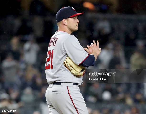 Tyler Duffey of the Minnesota Twins reacts after giving up a two rum home run in the seventh inning against the New York Yankees at Yankee Stadium on...