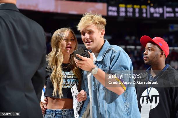 Jake Paul and Erika Costell attend the game between the Philadelphia 76ers and the Miami Heat in Game Five of Round One of the 2018 NBA Playoffs on...