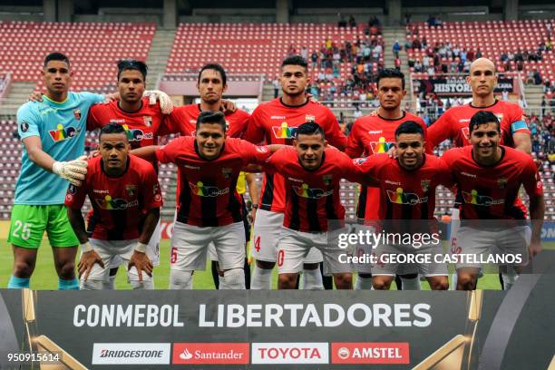 Venezuela's Deportivo Lara players pose before the start their Copa Libertadores football match against Colombia's Millonarios at the Metropolitano...