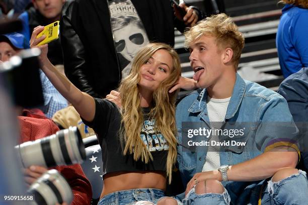 Jake Paul and Erika Costell during the game between the Philadelphia 76ers and the Miami Heat in Game Five of Round One of the 2018 NBA Playoffs on...